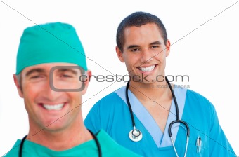 Portrait of positive male doctors