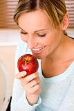 Young Healthy Woman Holding an Apple