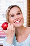 Beautiful Healthy Woman Holding an Apple