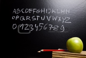 Alphabet and letters on a school blackboard