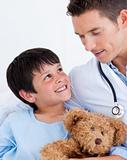 Portrait of a smiling little boy and his doctor