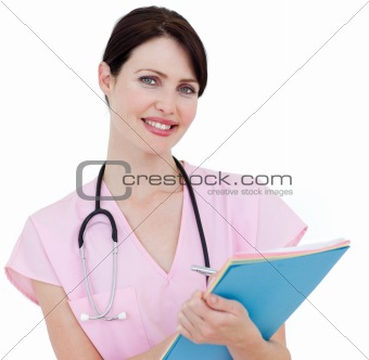 Self-assured nurse writing on a clipboard 