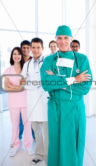 A diverse medical group standing in front of the camera 