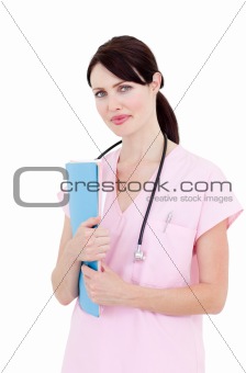 Portrait of an elegant nurse holding a stethoscope