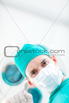 Confident surgeon during a surgery