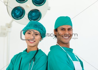 Close-up of two ethnic surgeons