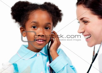 Adorable little girl and her doctor playing with a stethoscope 