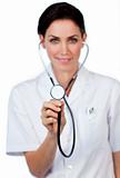 Smiling female doctor showing a stethoscope 