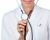 Close-up of a female doctor showing a stethoscope 