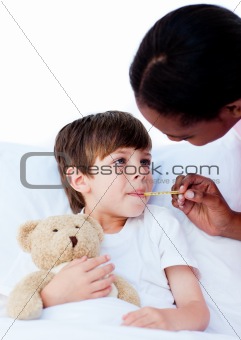 Cute little boy with his doctor in a hospital