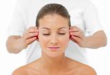 Attractive woman having a head massage 