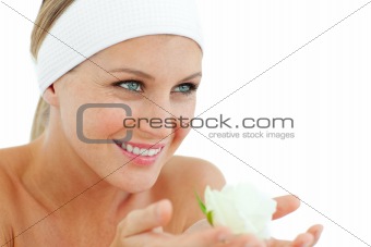 Sparkling woman holding a white rose 