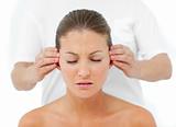 Relaxed woman having a head massage 