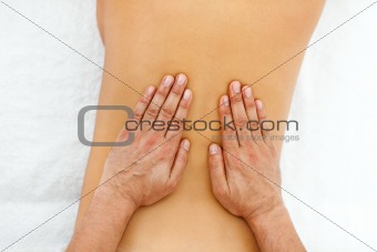Close-up of hands giving massage 