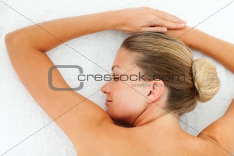 Blond woman relaxing after spa treatment