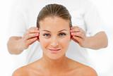 Charismatic woman having a head massage