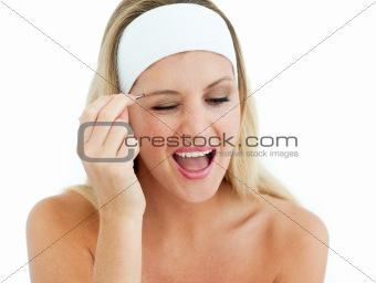 Charismatic woman using tweezers
