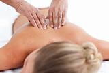 Attractive woman having a back massage