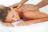 Blond woman enjoying a massage
