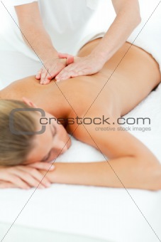 Happy woman enjoying a massage