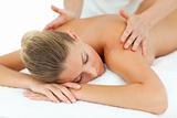  Positive woman enjoying a massage