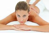 Reposing woman enjoying a massage