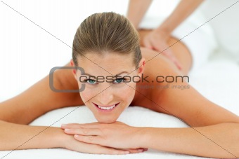 Peaceful woman enjoying a massage