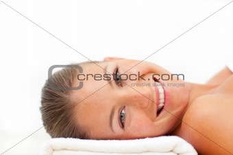 Portrait of cheerful woman relaxing after a spa treatment