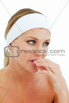 Pensive woman after having a spa treatment