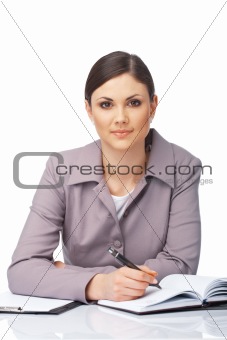 Businesswoman Writing In Her Diary.