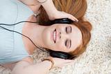 Teen girl listening to music 