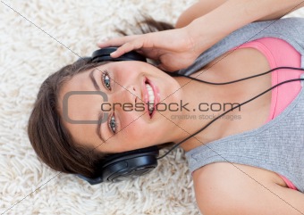 Beautiful teen girl listening to music 