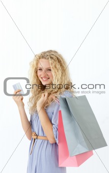 Beautiful teenager with shopping bags