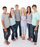 Group of friends standing against white background