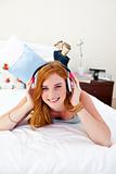 Smiling teenage girl listening to the music