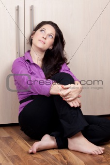 Relaxed young woman contemplating