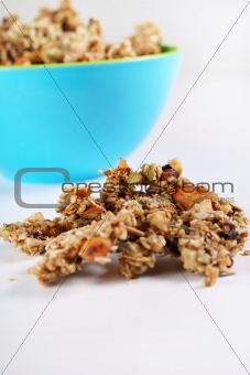 shot of gourmet granola in blue bowl vertical