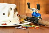 Fishing reel with hat and color lures