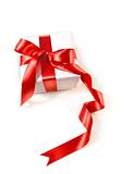 Gift box  with red satin ribbon