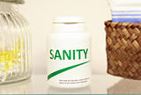 Sanity pills in a bottle on bathroom shelf