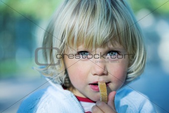 Little girl with bread