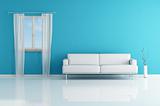 white sofa in a blue room