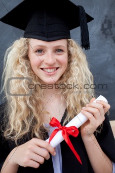 Portrait of a smiling teenage Girl Celebrating Graduation