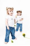 Adorable little twin girls isolated on white background 