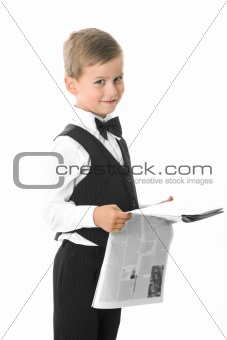 Boy holding a newspaper 