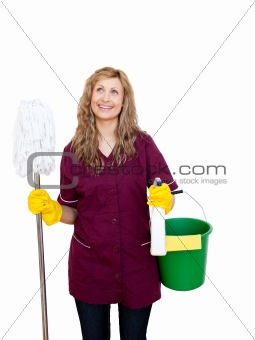 Smiling with cleaning utensils