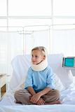 Little girl with a neck brace