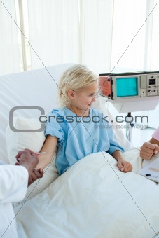 Little girl receiving an injection