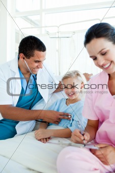 Smiling blond girl at a checkup