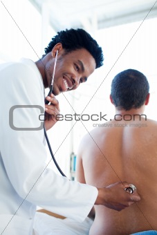 Afro-american doctor attending a male patient